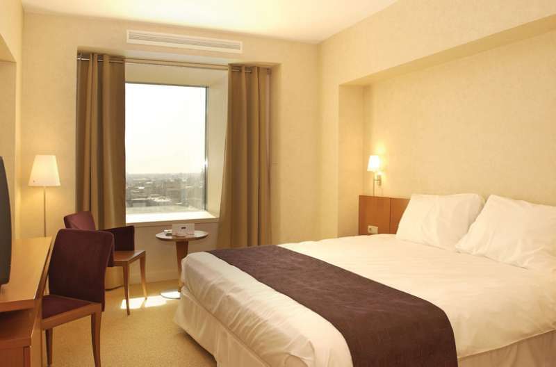 Sheraton Bucharest Hotel Exterior photo A room at the hotel